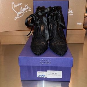 Brand new in box. Lace and satin booties.